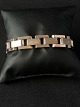 Guldarmbånd 3 
rækker blok i 8 
karat guld. 
Meget flot 
armbånd med 
ciseleringer i 
midterste 
række, ...