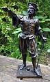 Ubekendt 
kunstner (19. 
årh.), Jæger 
med armbrøst. 
Renaisancefigur.
 Skulptur i 
patineret 
bronze. ...