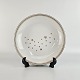 Dyb tallerken i 
porcelæn, fra 
serien 
Mælkevejen. Nr. 
22
Producent Bing 
& ...