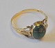 14 carat gold 
ring with 
malachite, Hugo 
Grün, 20th 
century 
Copenhagen, 
Denmark. 
Stamped. Size: 
...
