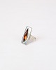 Vintage ring i 
tin, udsmykket 
med rav, 
designet af 
Jørgen Jensen i 
1960'erne. 
Jørgen Jensen, 
...