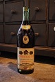 Dekorativ , 
gammel reklame 
Cognac´s flaske 
"Courvoisier - 
The brandy of 
Napoleon" i 
glas. ...