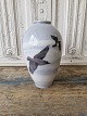 Royal 
Copenhagen Art 
Nouveau vase 
dekoreret med 
krager der 
flyver over et 
vinterlandskab 
No. ...
