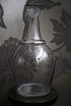 Old French wine 
decanter in 
glass. H: 31cm. 
Dia.: 16cm. 
The decanter 
has a small 
crack in the 
...