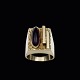 Flemming 
Kjerulff. Ring 
i 14k guld med 
ametyst.
Tegnet og 
udført hos 
Flemming Knud 
Kjerulff ...