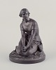 L. Hjorth, 
Bornholm. 
Figur af 
Jeanne d'Arc i 
sort 
terrakotta. 
Modelnummer 
597. 
Ca. ...