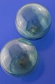 Fine gamle 
fiskekugler af 
grønt glas, 
flydelod til 
fiskeri. 
Diameter ca. 10 
cm. Stemplet 
P.C.F. ...