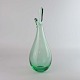 Næbvase i 
mundblæst grønt 
glas fra 
1954-59
Formgiver Per 
Lütken
Producent ...