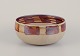 Hjort, 
Bornholm. 
Unique ceramic 
bowl. 
Glaze in brown 
and sand 
colored shades.
Ca. ...