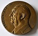 Bronze medalje, 
Stadion - 
Säätio, 
Helsingfors, 
Finland. 1927 - 
1977. Udført af 
Aimo Tukiainen. 
...