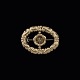 Evald Nielsen. 
Skønvirke 
Broche i 18k 
guld.
Designet og 
udført hos af 
Evald Nielsen 
(1879 - ...
