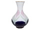 Antik Bing & 
Grøndahl Art 
Nouveau vase 
med lyserøde 
blomster og 
guldkant.
Af 
fabriksmærket 
...