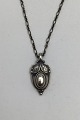 Georg Jensen 
Sterling Silver 
Annual Pendant 
2003 Measures 
3.4 cm x 1.6 cm 
(1.33 inch x  
0.62 ...