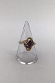 14K Gold Ring 
with Amethyst 
and Diamonds 
Measures Ring 
Size 52 (US 6) 
Weight 2.8 gr. 
(0.10 oz)