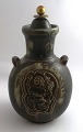 Royal 
Copenhagen. 
Stoneware. 
Vase. Model 
2938 with 
bronze lid. 
Bode Willumsen. 
Height 25 cm. 
(1 ...