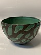 Ceramic glazed 
bowl, in green 
and brown 
colours.
Height: 8.6 
cm.
Diameter: 13.5 
cm.
Is ...