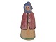 Hjorth keramik 
miniature 
figur, dame i 
egnsdragt.
Højde 9,5 cm.
Perfekt stand 
uden fejl.