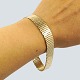 A bracelet of 
8k gold. Clasp 
with two safety 
catches.
L. 21,5 cm. W. 
12,5 mm.
Stamped "JLA 
333".