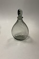 Holmegaard 
Karaffel Grå  / 
Smoke
Måler 22,5cm / 
8.86 inch

