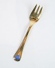 Georg Jensen's 
annual cake 
fork made of 
gold-plated 
sterling silver 
from 1990.
Dimensions: 
...