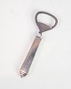 Bottle opener 
model 271 in 
sterling silver 
and steel, the 
handle is in 
sterling silver 
and ...