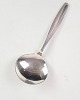 This sugar 
spoon is part 
of Georg 
Jensen's 
"Cypres" 
series, 
designed by 
Tias Eckhoff in 
1954. ...