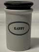 Eslau, Curry 
spice jar 
designed by 
Bjarne Bo. Matt 
glazed with 
black wooden 
lid, fits the 
...