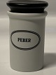 Eslau, Pepper 
spice jar 
designed by 
Bjarne Bo. Matt 
glazed with 
black wooden 
lid, fits the 
...