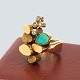 Anette Kræn; 
Ring of 14k 
gold with 
diamonds and 
amazonite