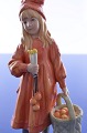 Royal porcelain 
figure "Brita" 
girl with 
apples. no. 986 
of 7500 copies 
produced, 
reproduced ...