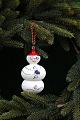 Old glass 
Christmas tree 
ornament in the 
shape of a ...