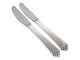 Georg Jensen 
Pyramid 
sterling 
silver, dinner 
knife with 
short knife 
blade.
Length 22.6 
cm. ...
