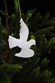 Christmas tree 
ornament in the 
shape of a 
small dove of 
...