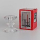 Lille Festivo 
lysestage i 
klart 
struktureret 
glas med en 
ring. Stagen 
kommer i 
original ...