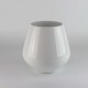 Vase i porcelæn 
fra serien Hvid 
Riflet. Nr. 681
Producent 
Royal 
Copenhagen
Hvid Riflet er 
...