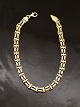 14 karat guld 
armlænke 19,5 
cm. B. 0,5 cm. 
stemplet 585 
vægt 5 gram. 
emne nr. 602119