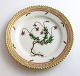 Royal 
Copenhagen, 
Flora Danica. 
Cake plate. 
Design # 3552. 
Diameter 14 cm. 
(1 quality). 
...