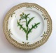 Royal 
Copenhagen 
Flora Danica. 
Lunch plate 
with open-work 
border. Design 
# 3554. 
Diameter 23 cm. 
...