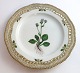 Royal 
Copenhagen 
Flora Danica. 
Lunch plate 
with open-work 
border. Design 
# 3554. 
Diameter 23 cm. 
...