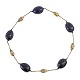 Rare necklace 
by Arje 
Griegst, Royal 
Copenhagen, and 
gilt 
sterlingsilver 
by A. 
Michelsen, ...