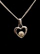 Sterling silver 
heart pendant 
1.2 x 1.3 cm. 
with small 
zircon 
surrounded by 
enamel and 
sterling ...