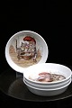 Royal 
Copenhagen glas 
/ flaske bakke 
i porcelæn med 
forskellige 
julemotiver af 
nisse og kat 
der ...