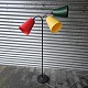 Lampe med fod 
af støbejern og 
arme i messing.
Skærme af 
strimler af 
blød plastic i 
rød, gul og ...