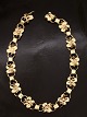 14 karat guld 
armlænke 20,5 
cm. B. 8.8 cm. 
vægt 7,8 gram 
stemplet 585 
emne nr. 604339