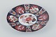 Japansk Kutami 
fad i porcelæn.
Hånddekoreret 
med 
blomstermotiver.

Gulddekoration.

Ophæng i ...