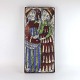 Relief i 
glaseret 
keramik med 
motiv af mand 
og kvinde. Nr. 
5441-5
Producent 
Michael 
Andersen, ...