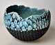 Dansk keramiker 
(20. årh): 
Skål. Raku. Med 
turkis glasur. 
H.: 8,5 cm. 
Dia.: 12 cm. 
