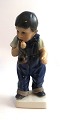 Dahl Jensen. 
Porcelænsfigur. 
Dreng med pibe. 
Model 1027. 
Højde 17 cm. (1 
sortering)