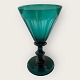 Anglais glas, 
facetslebet, 
blågrønt, Højde 
12,2cm, 
Diameter øverst 
7,4cm, diameter 
fod 6,4cm.