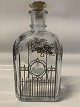 Holmegaard dram 
bottle 
Christmas 2007.
Year: 2007.
Height 18.5 
cm.
Nice and 
well-maintained 
...